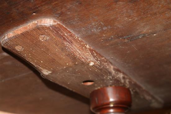 A circular Victorian walnut tripod table W.59.5cm